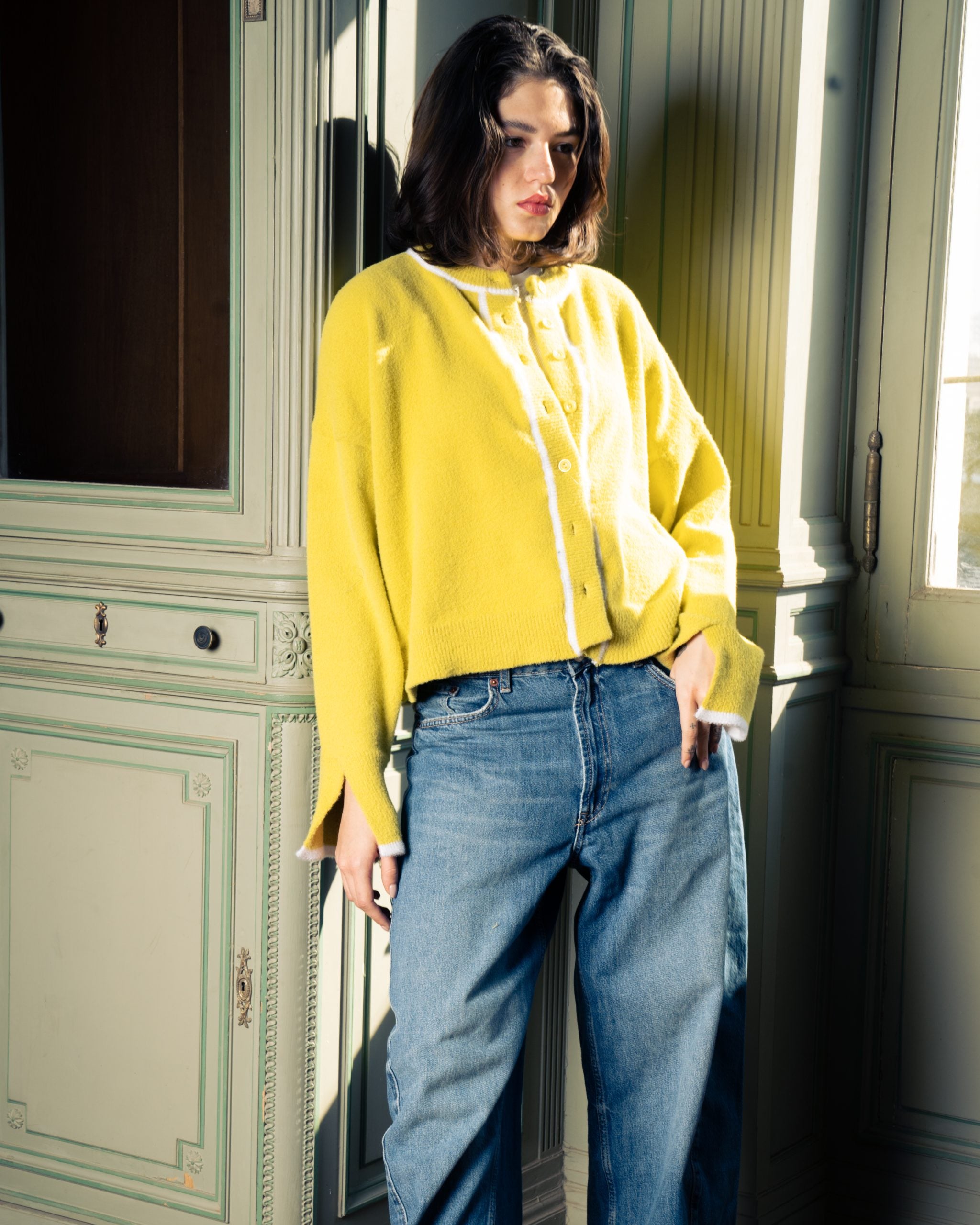 Yellow cardigan with white trims image 1